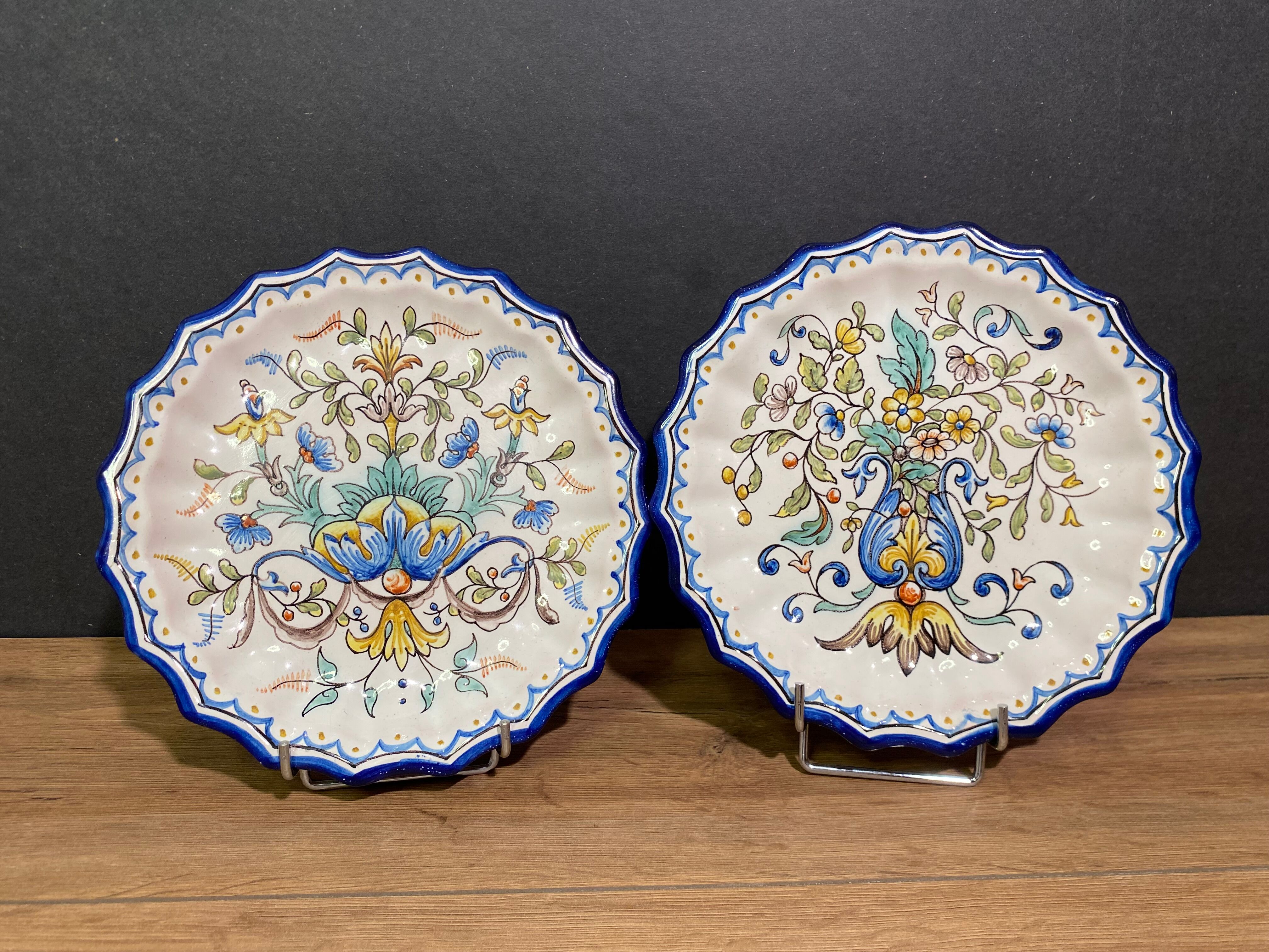 Pair of plates with floral decoration in Nevers earthenware signed Montagnon