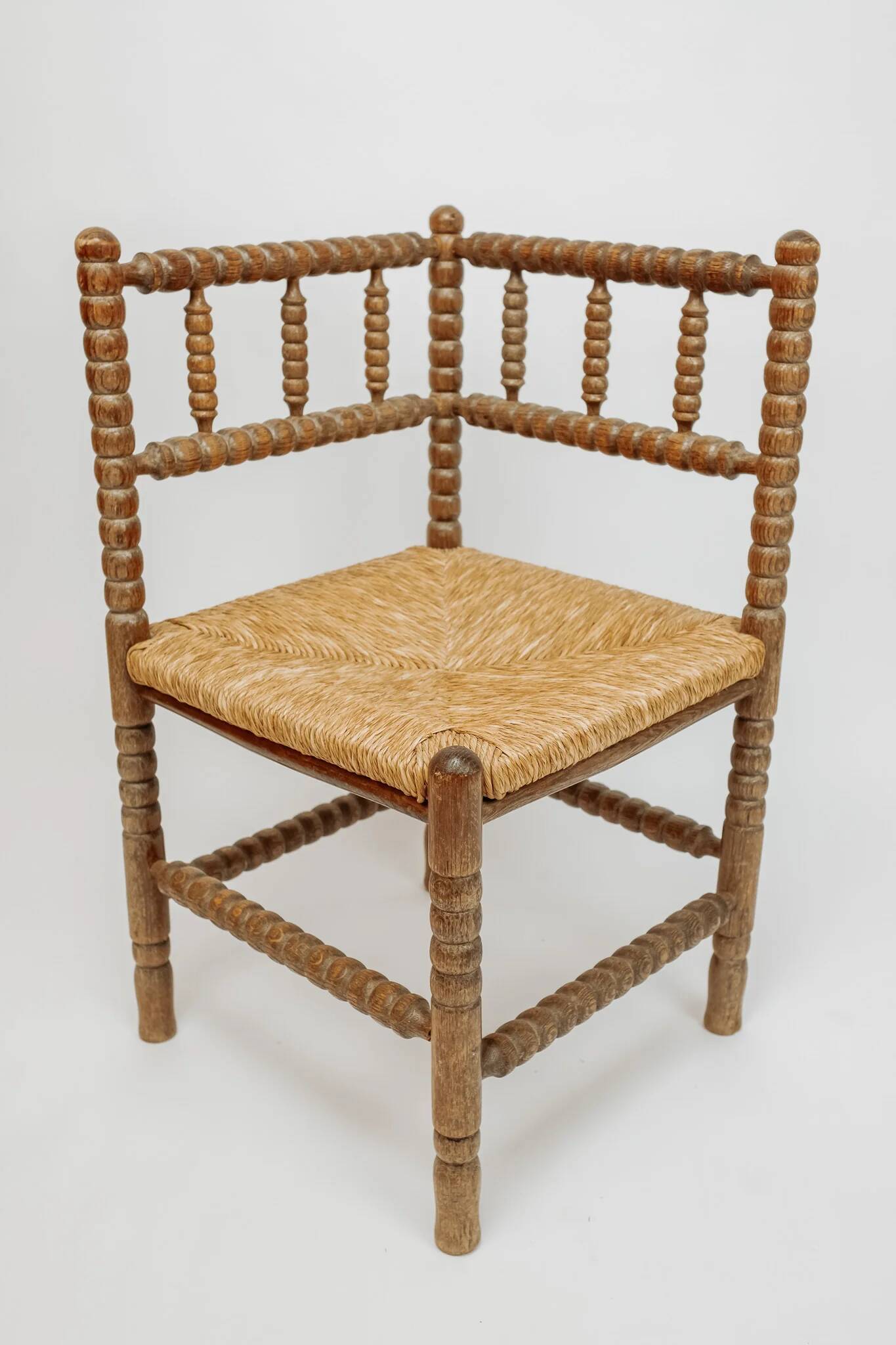 Classic vintage bobbin corner armchair