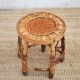 Vintage bamboo stool, woven rattan plant stand, interior decoration.