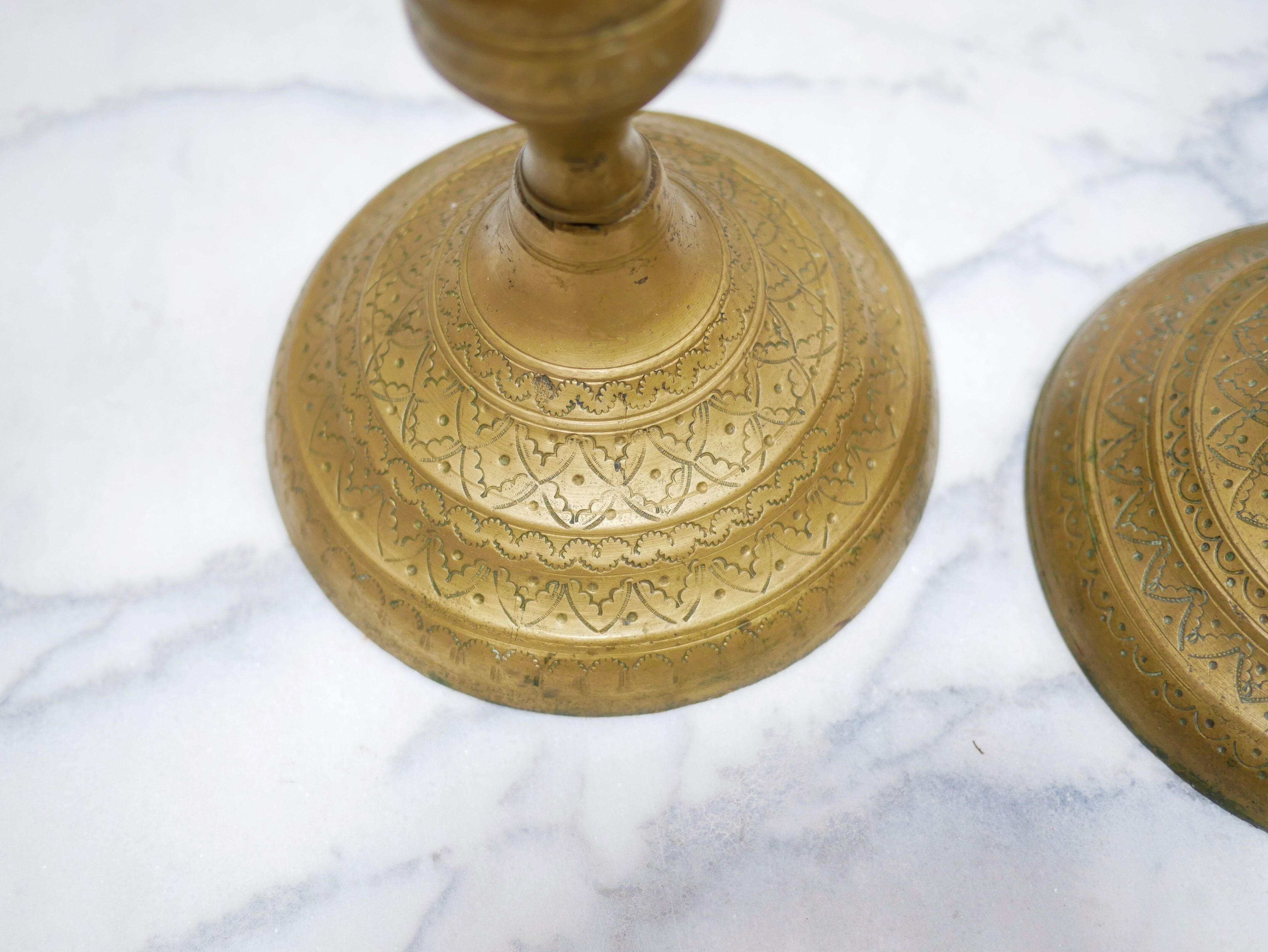 Pair of vintage candle holders in golden brass