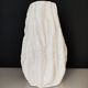 Glass vase in the shape of stone or coral