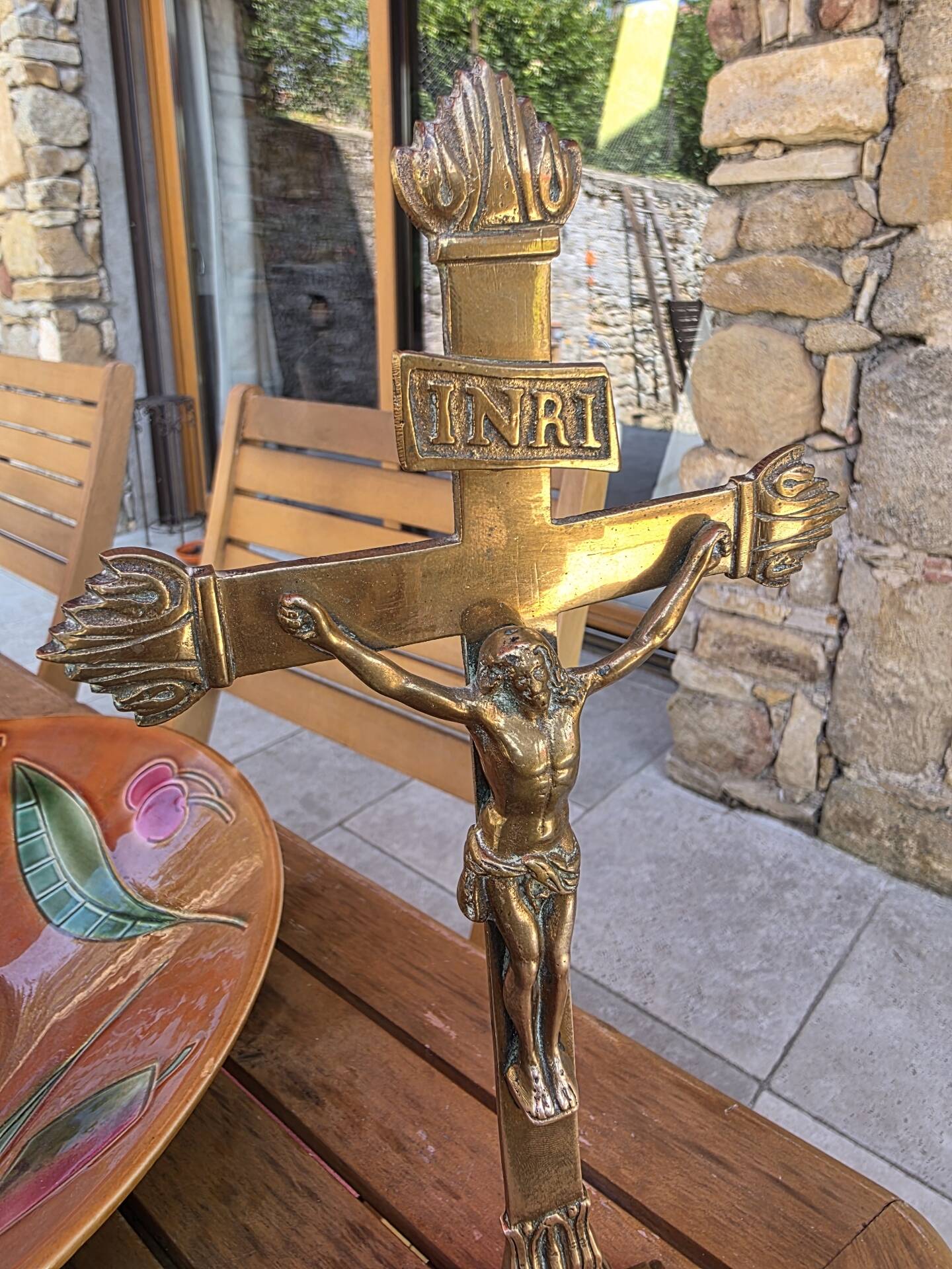 19th-century brass crucifix on a base