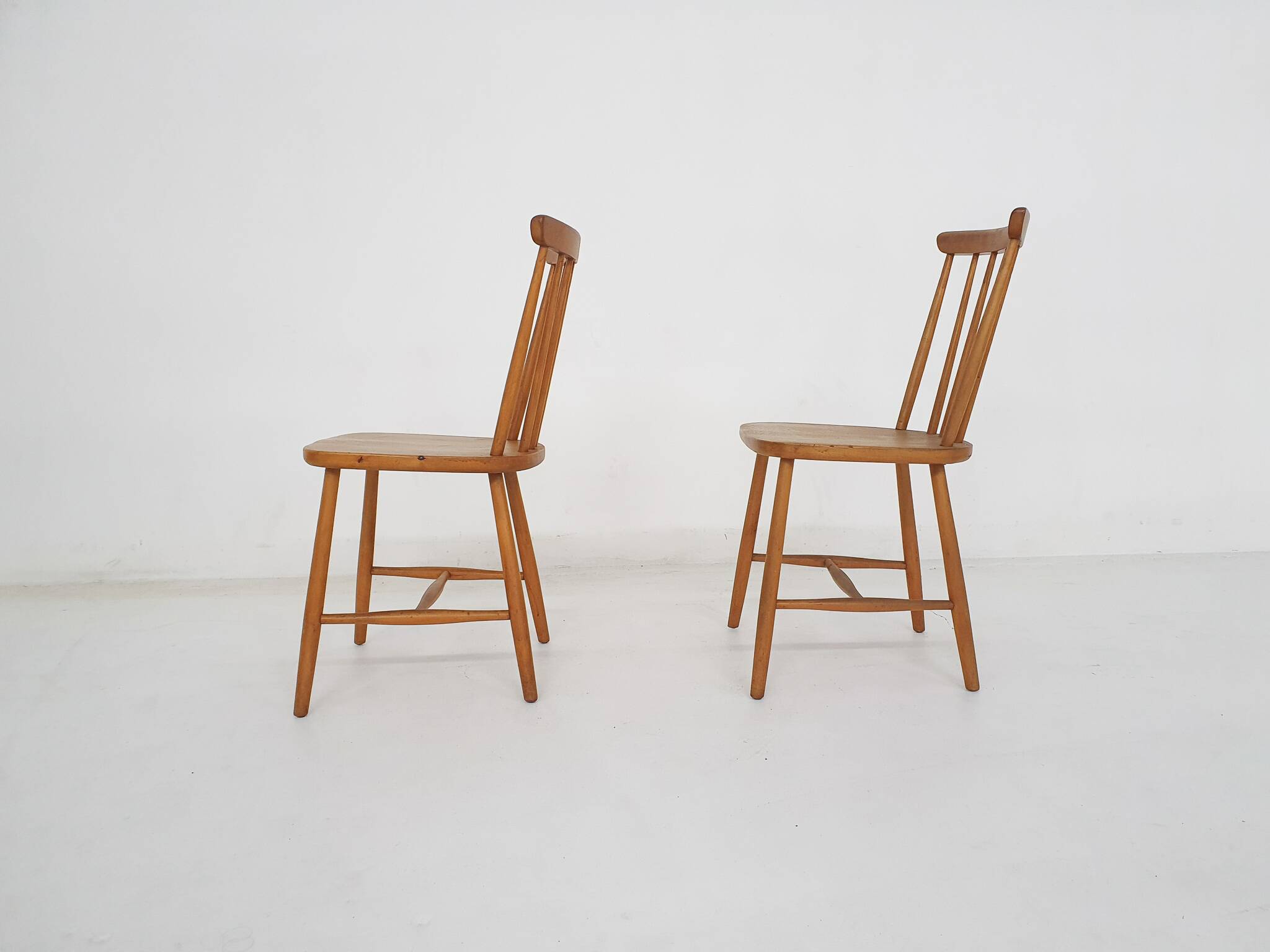 Set of two spindle back chairs, The Netherlands 1950's