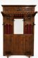 Antique neo-Renaissance hall coat rack with mirror and umbrella stand.