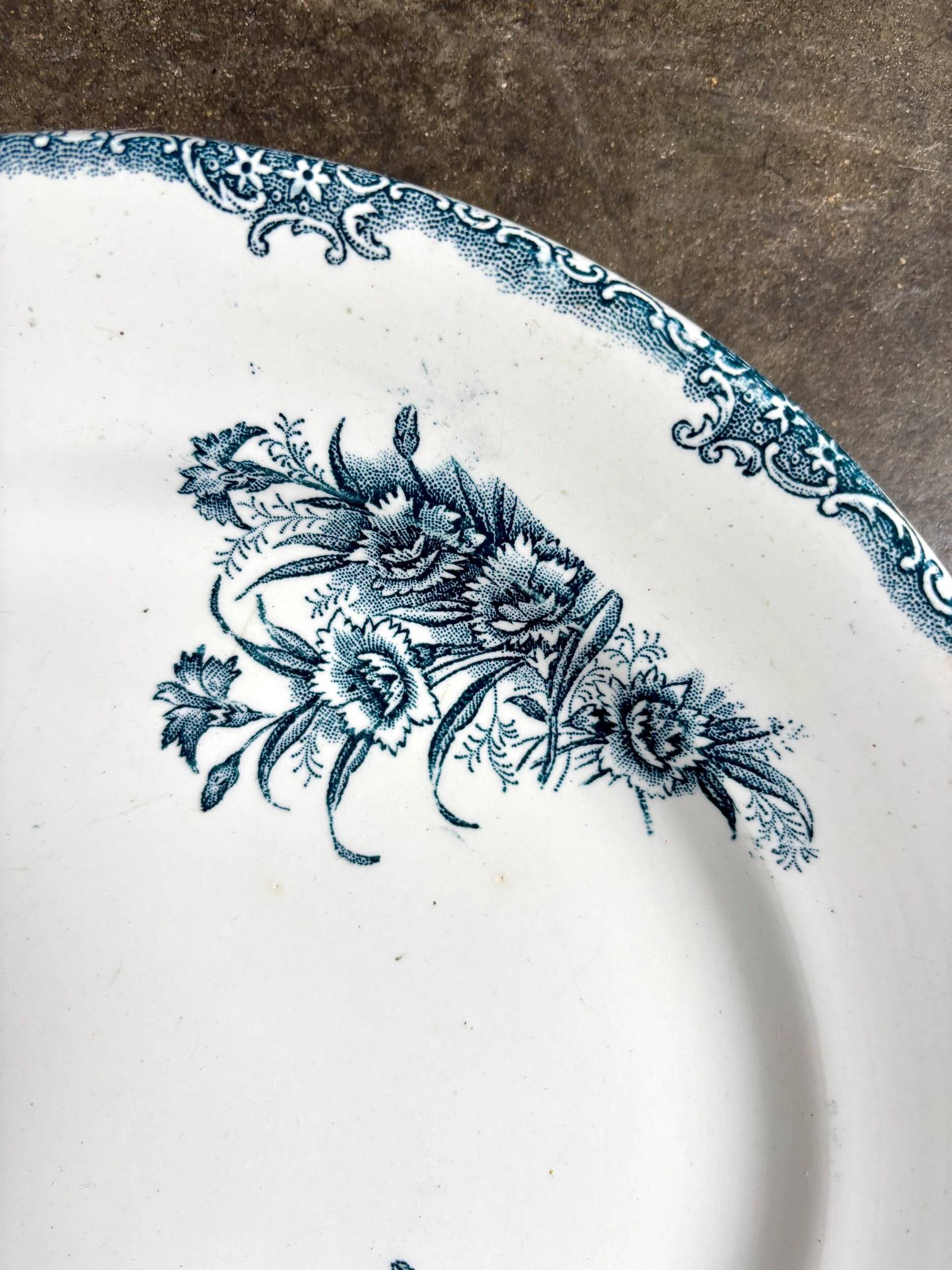 Léon Graves round dish in blue ironstone, "Oeillets" service