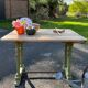Old table with patinated green legs