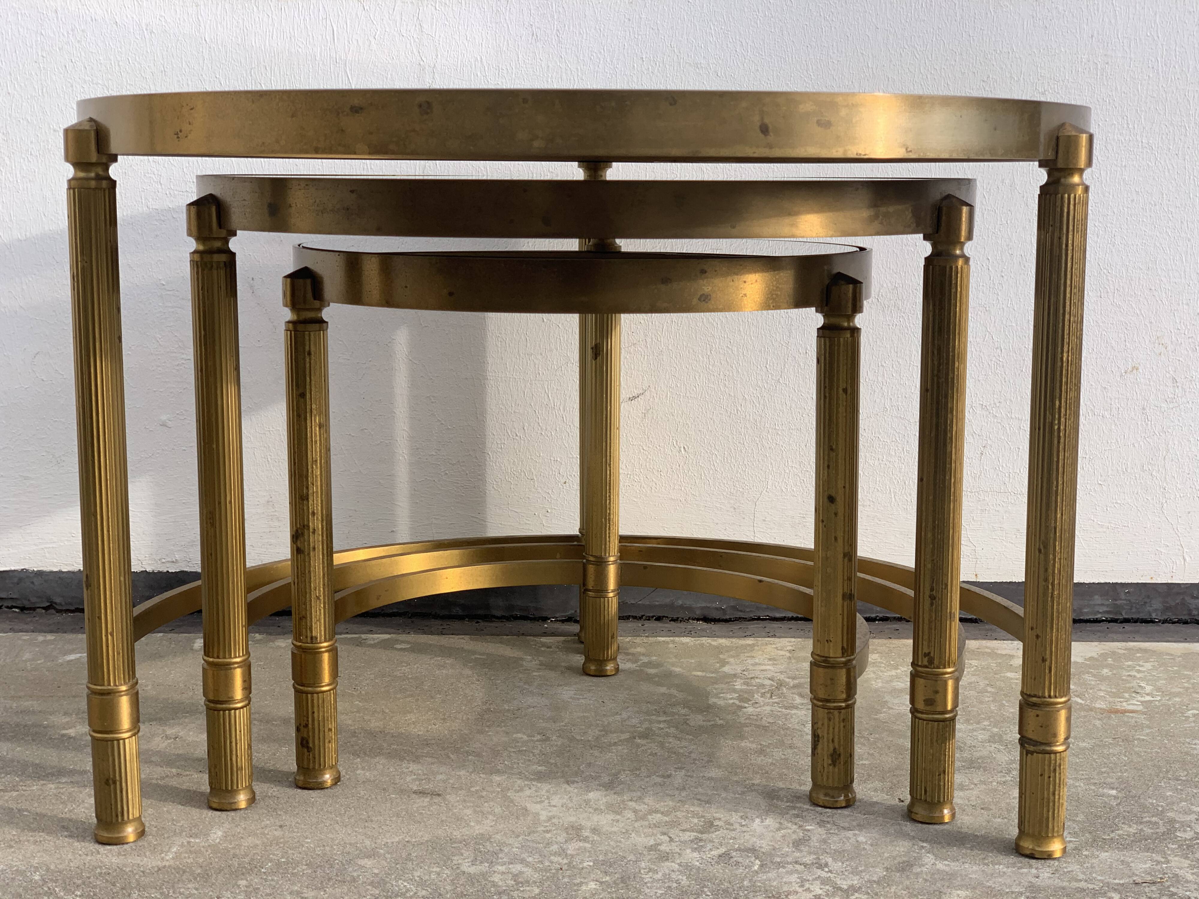 Three round brass tables 1970