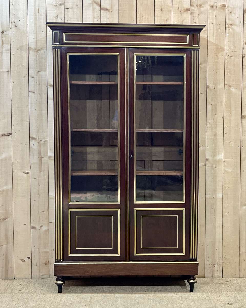 Napoleon III library in mahogany and brass nets (XIXth)