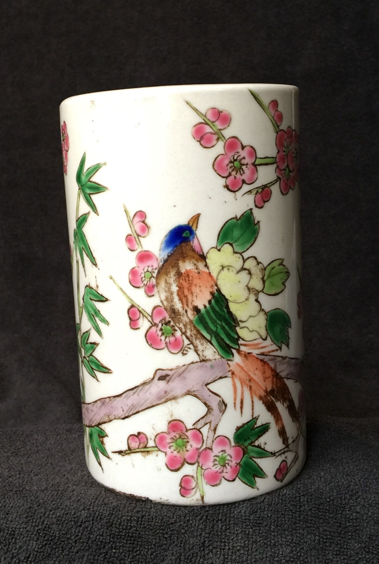 Small vase roll decoration birds branches of cherry blossoms and flowers