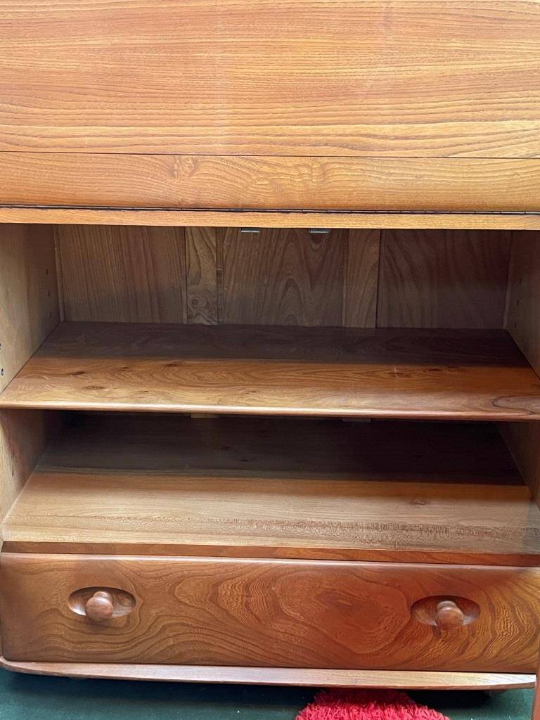 Ercol English wooden secretary, on wheels – 1970s.
