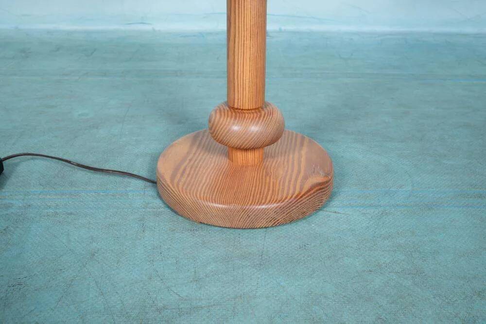 Vintage Swedish wooden floor lamp with pleated shade from the 1960s.