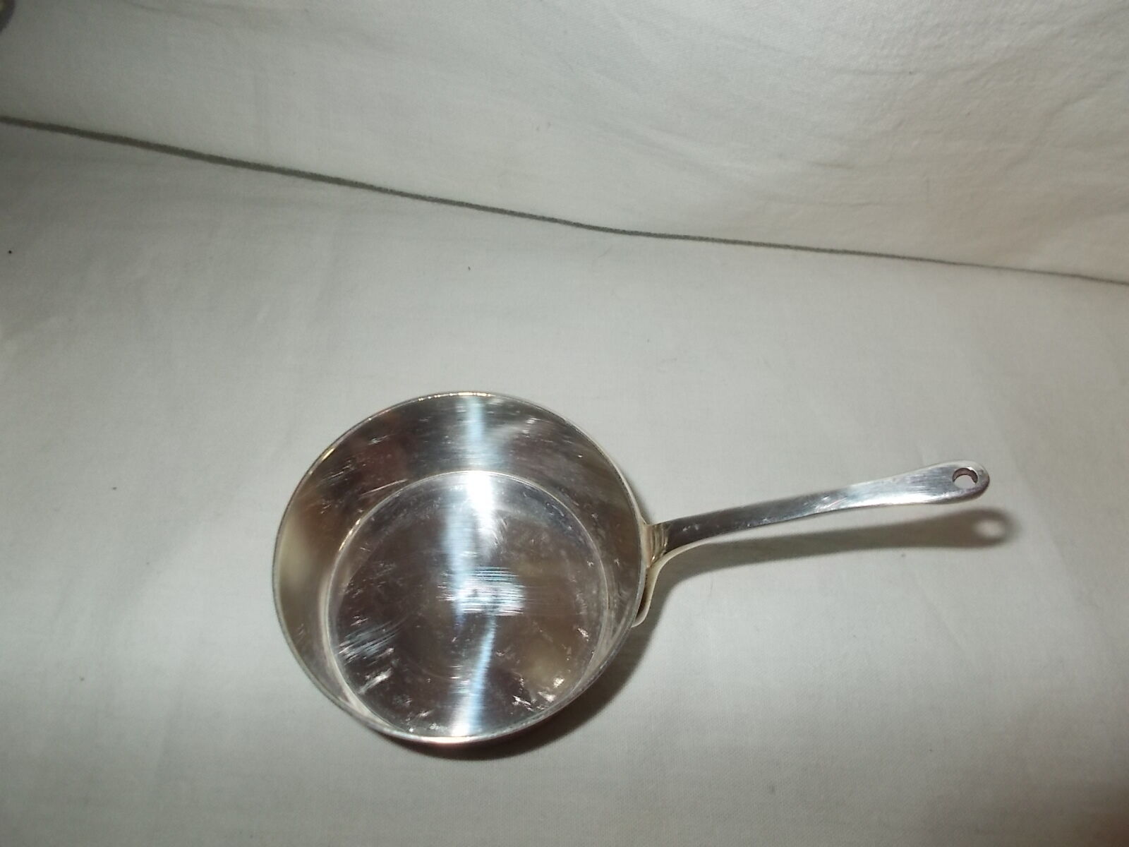 Set of 5 small silver metal poelons