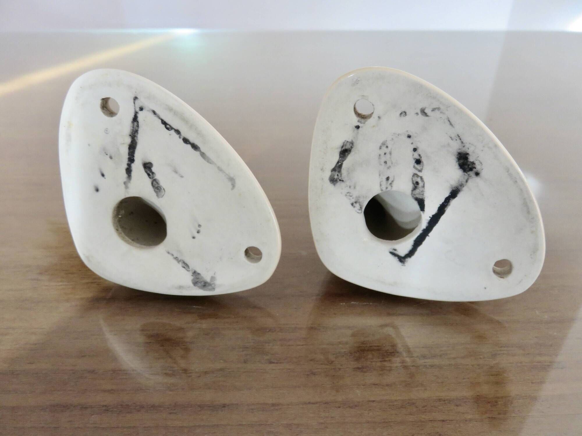 Pair of salmon-colored art deco porcelain hooks from the 30s and 40s