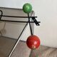 Iron wall coat rack and wooden hooks from the 60s