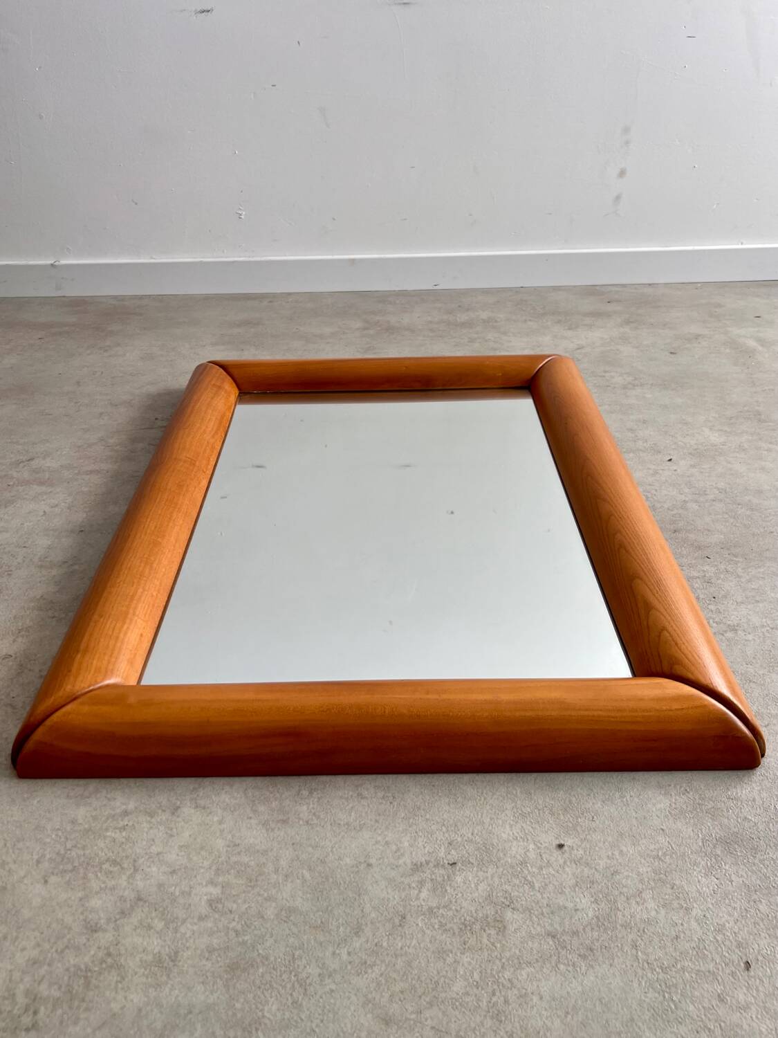 Old mirror in solid elm design from the 70s vintage brutalist style