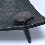 Brutalist metal pocket with patinated tripod