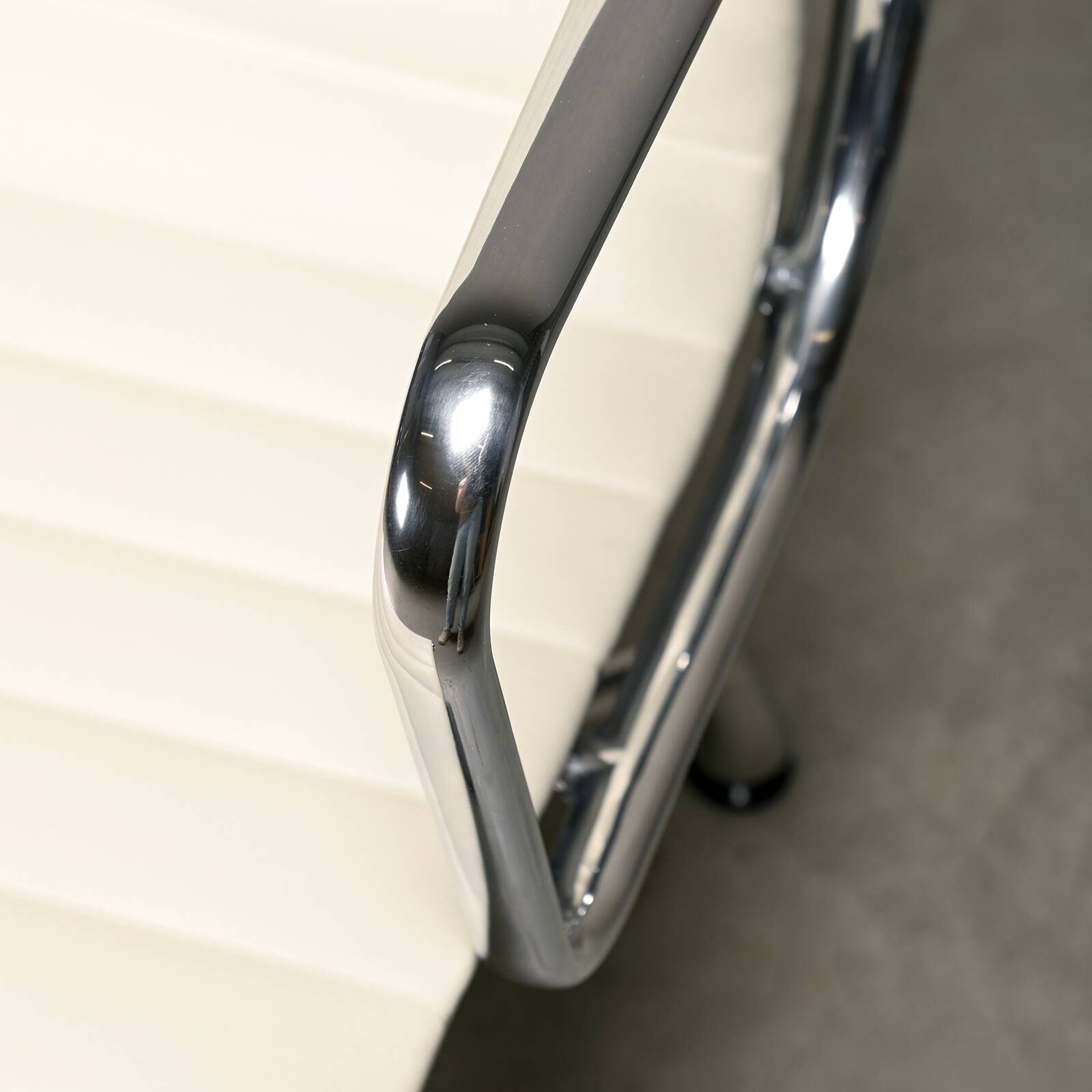 Charles & Ray Eames EA108 Dining Chair in Polished Aluminum and White leath