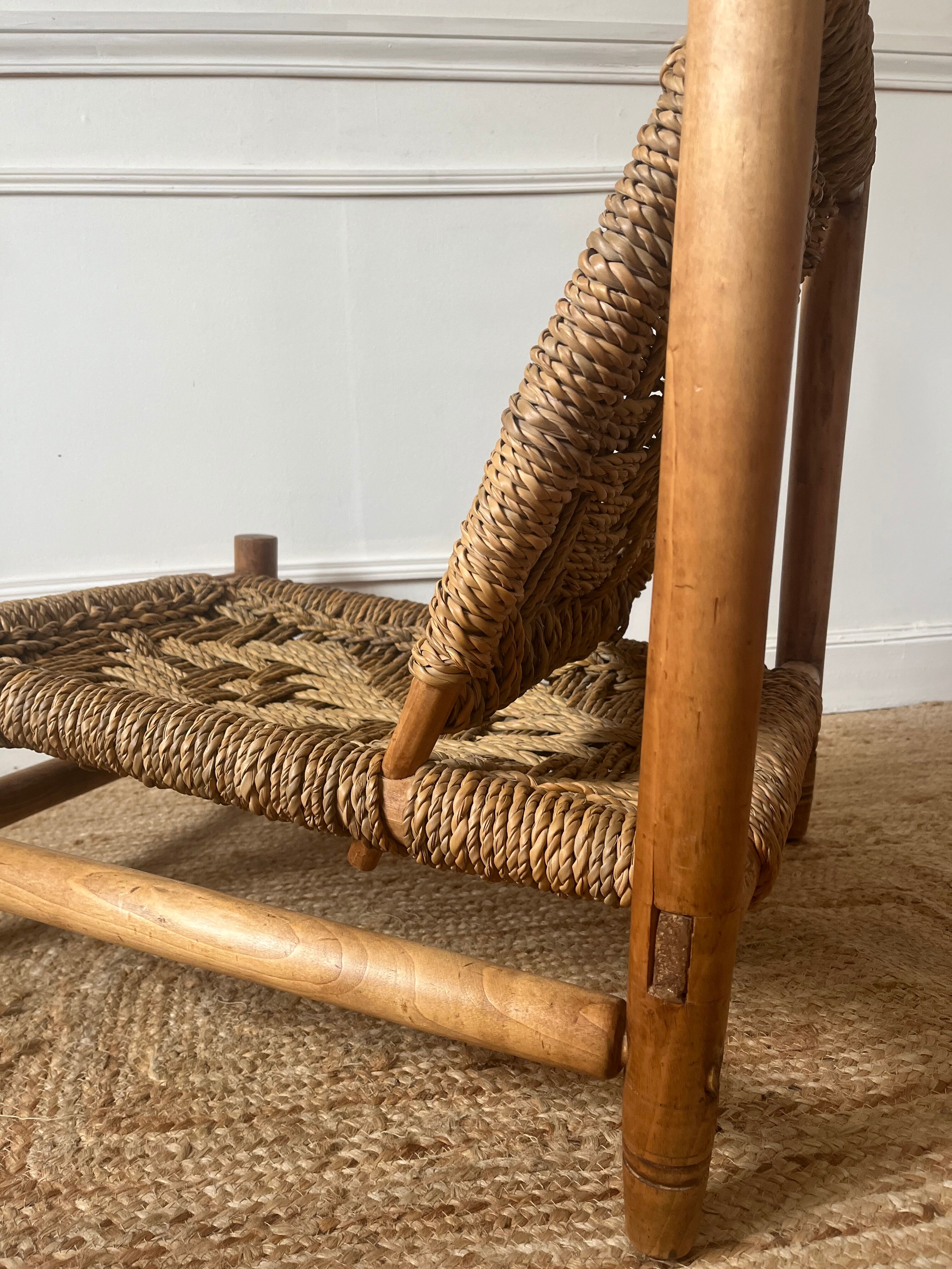 Wood and rope armchair by Audoux and Minnet from the 1950s.