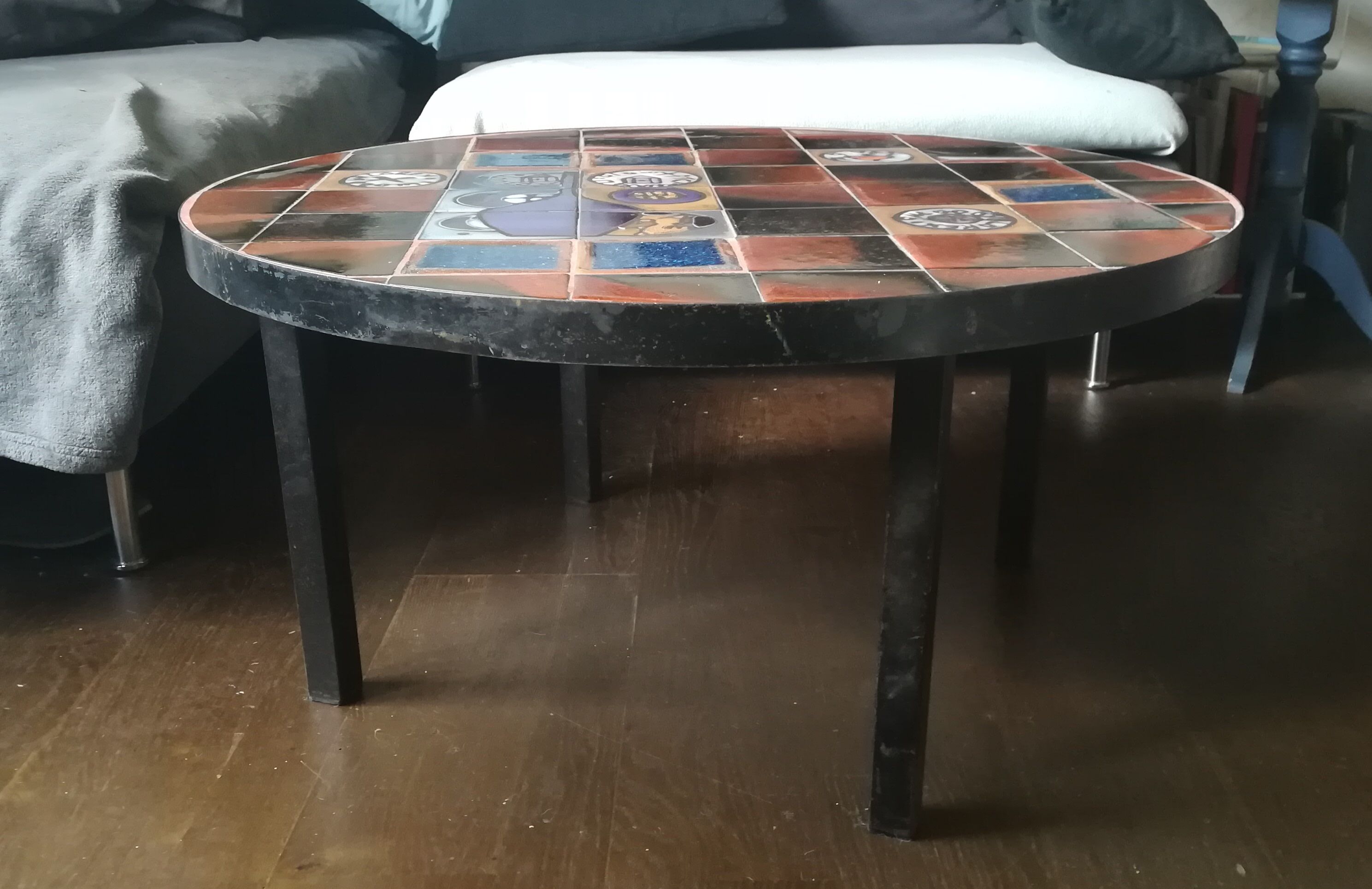 Coffee table, ceramic tray, metal feet, circa 1960