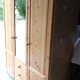 Wardrobe three doors, one with mirror, three drawers in solid pine wood
