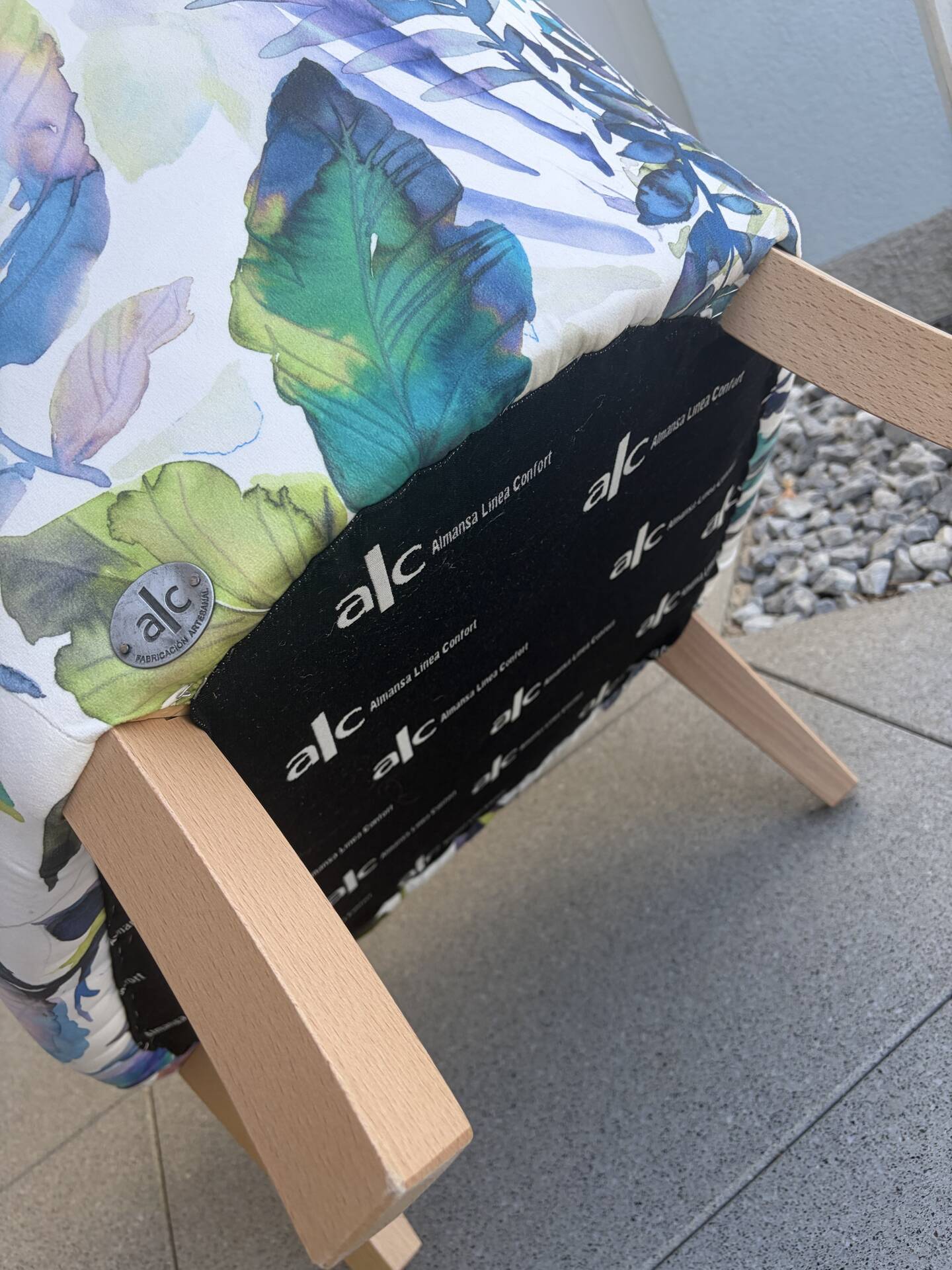 Contemporary ALC frog chair, reupholstered in watercolour floral fabric.