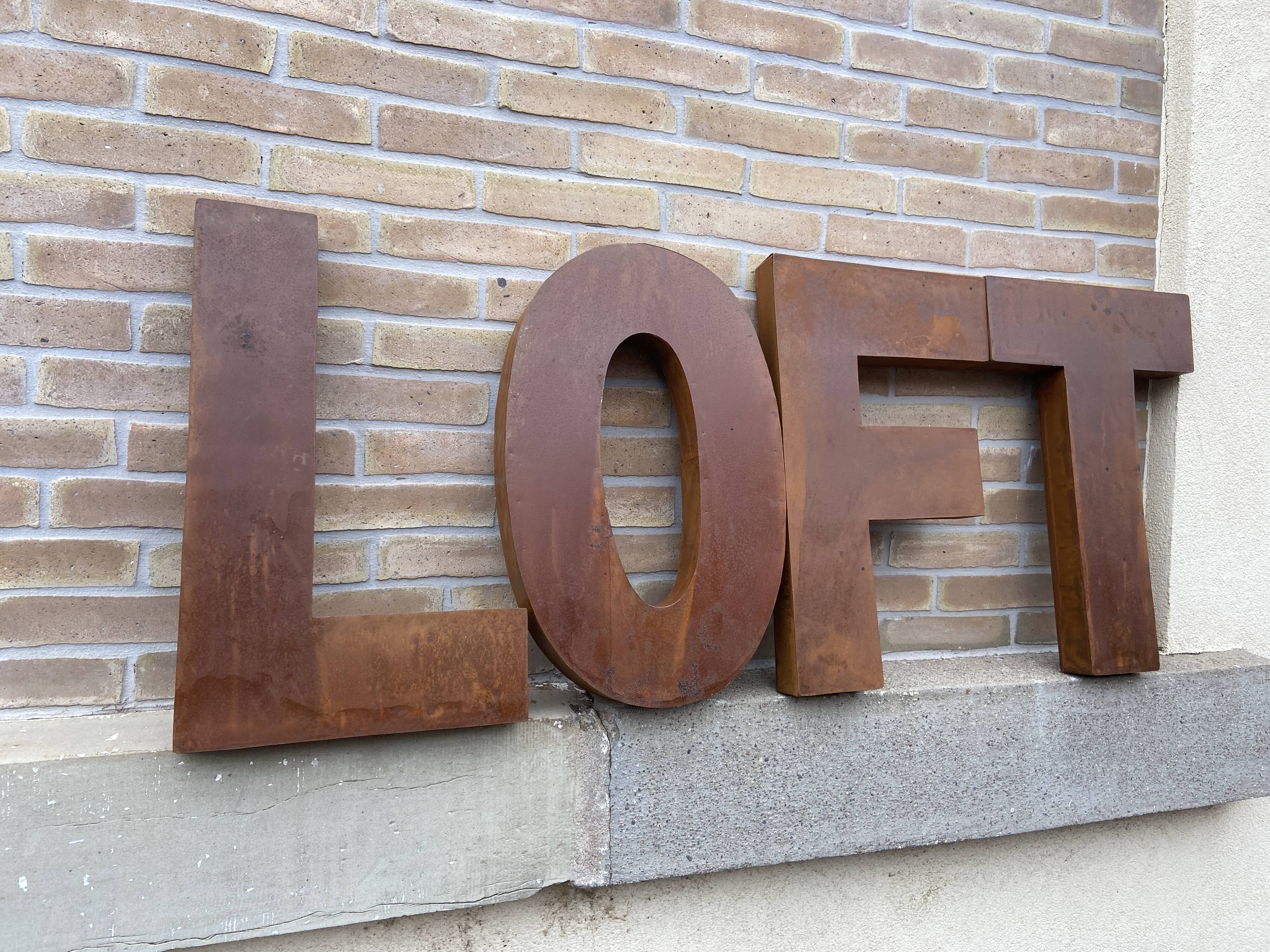 LOFT sign in vintage metal letters