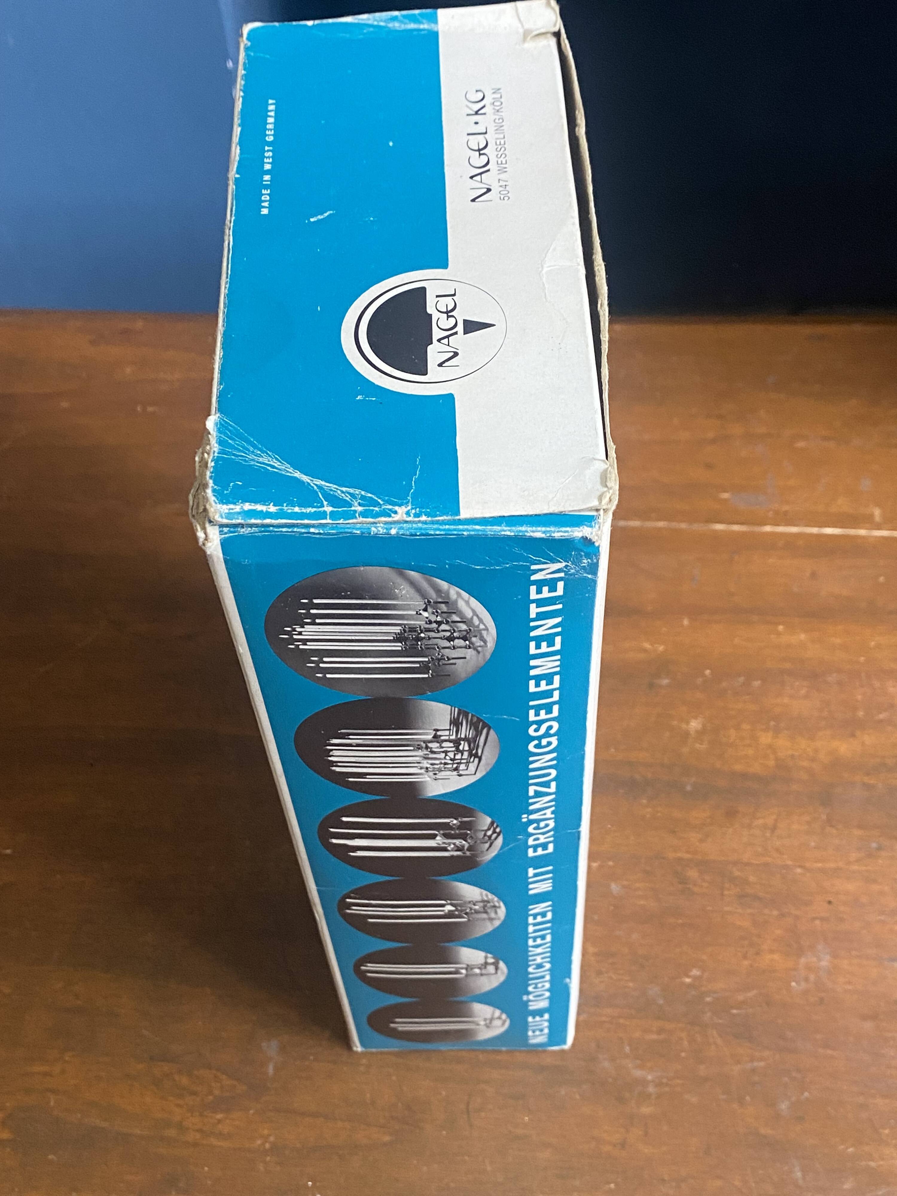 Set of 3 S22 candle holders and 9 vintage 1970 NAGEL modular candles in box.