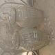 Two hyacinth vases in molded glass with vintage geometric patterns