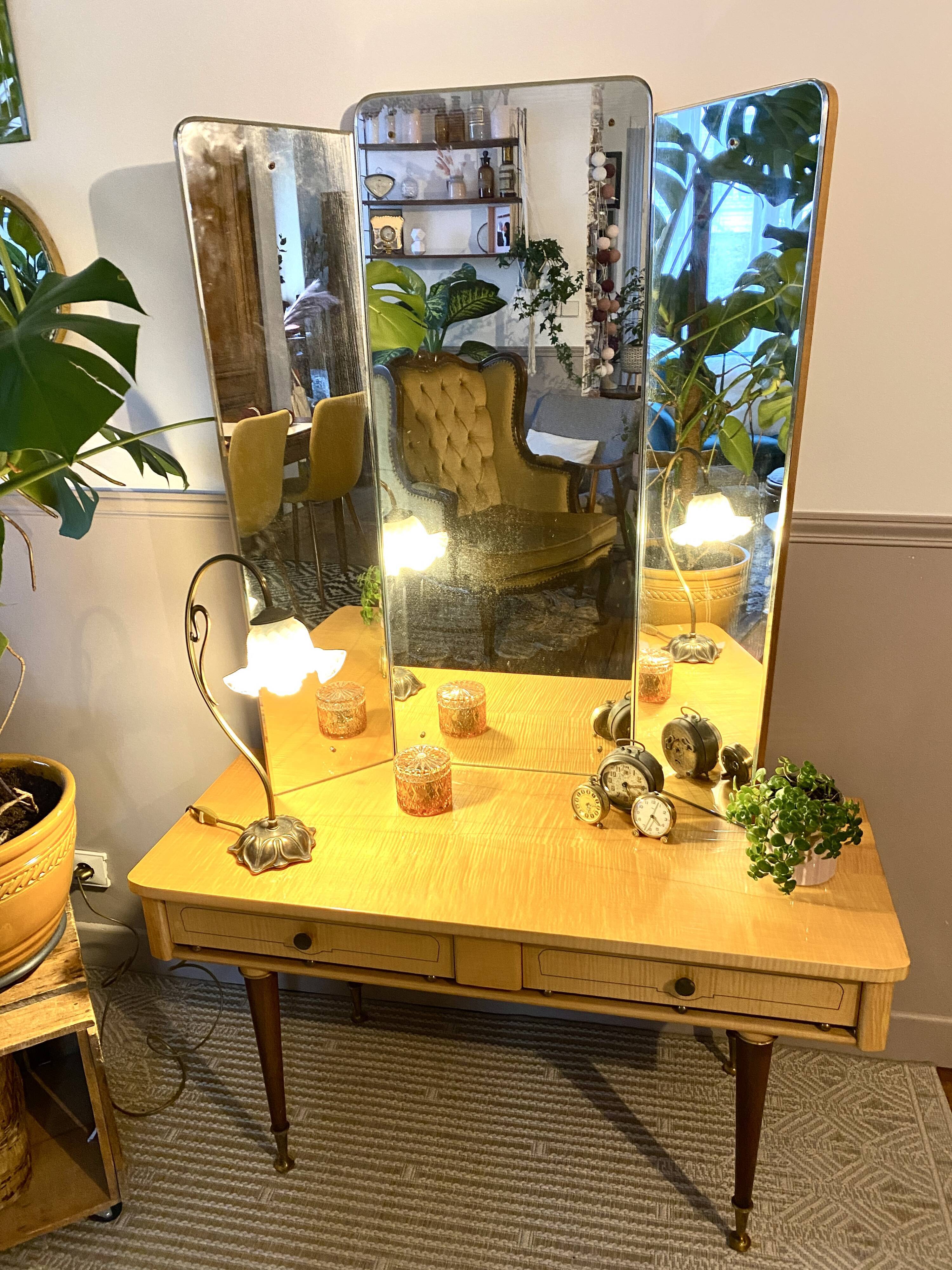 Dressing table in a vintage mirror triptych