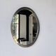 Miroir en métal argenté ovale 1950