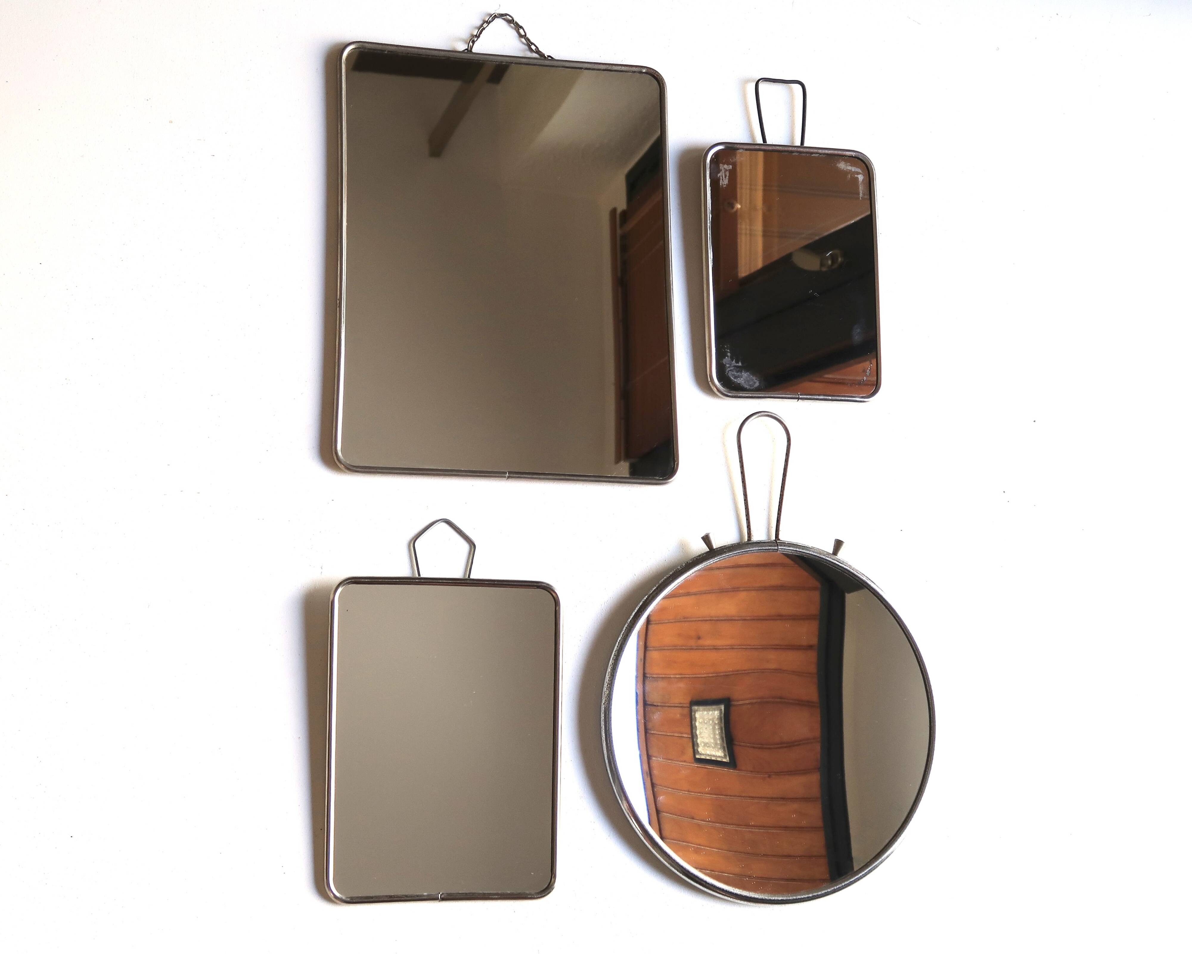 Set of four rectangular and round barber mirrors, 1950s.