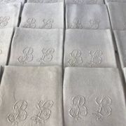 Set of 12 19th century white napkins marked “BL”