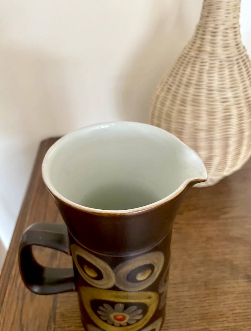 Enamelled ceramic carafe