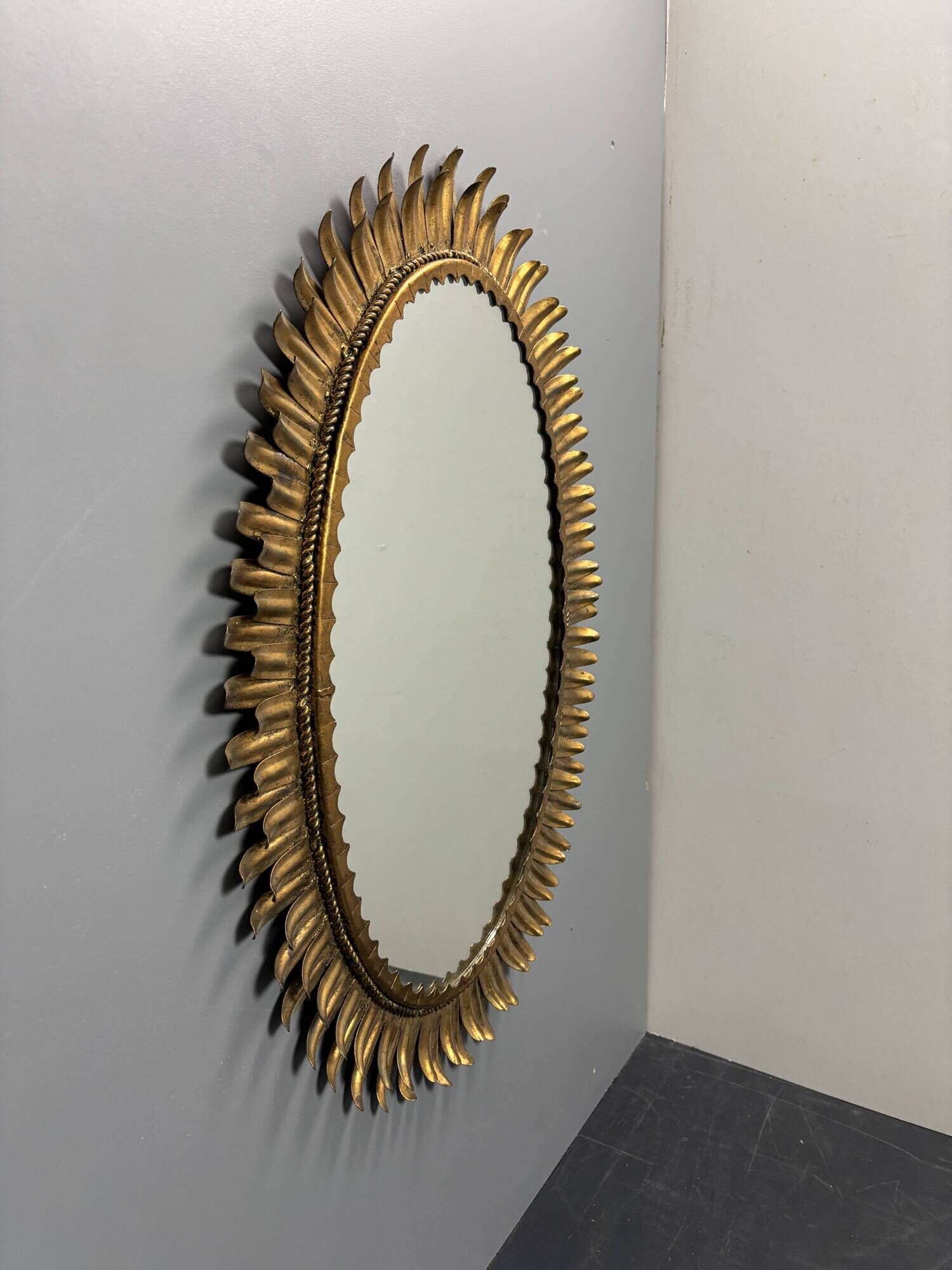 Midcentury bohemian Hollywood Regency Spanish gilt metal sun mirror, 1960s