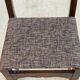 6 solid wood dining chairs with grey woven wool seats.
