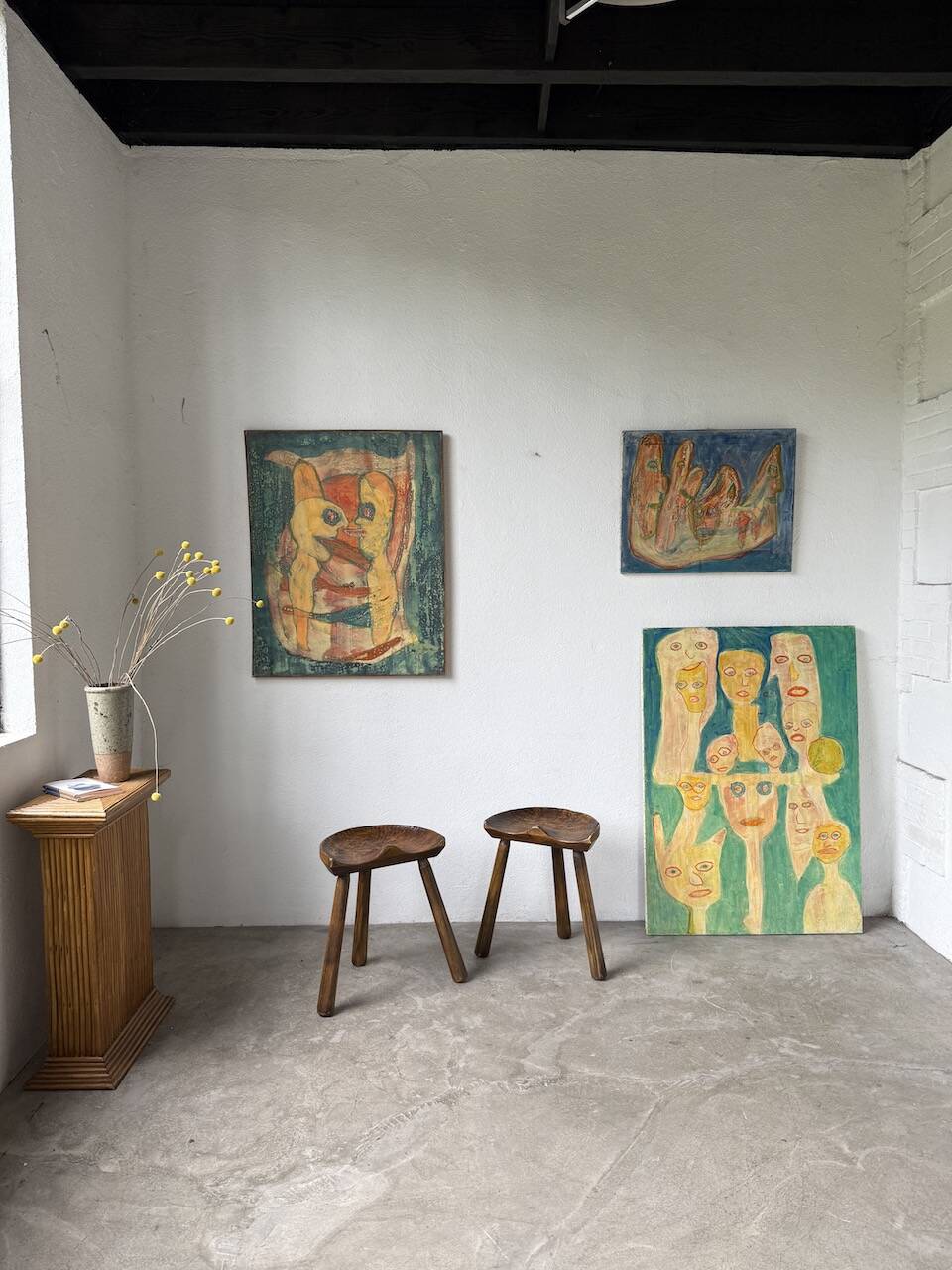 Pair of Le Selou tripod shepherd's stools