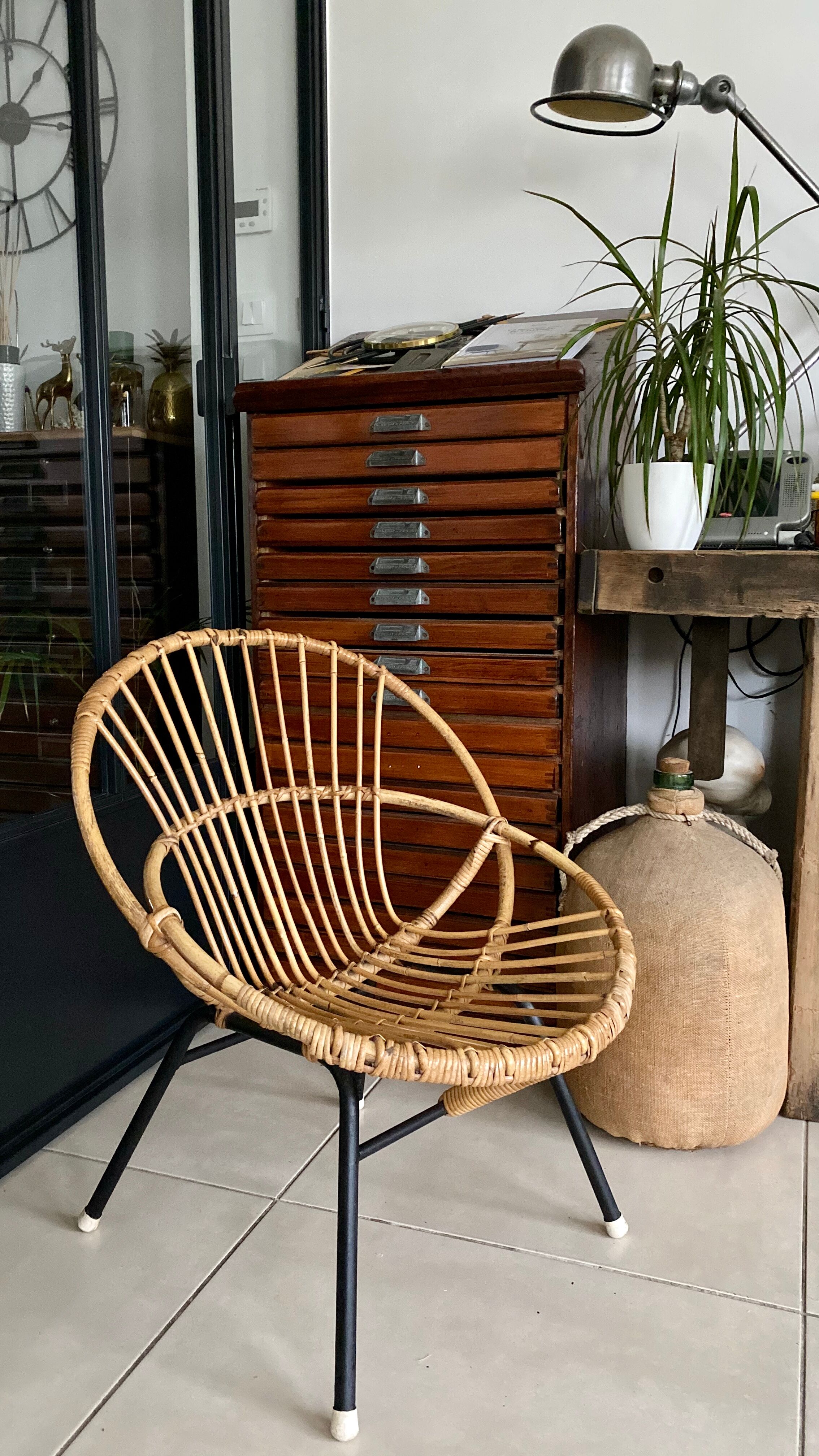 Old vintage metal foot rattan chair
