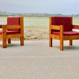 Pair of pine fireside chairs, France, 1960s, "raspberry" cushions