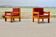 Pair of pine fireside chairs, France, 1960s, "raspberry" cushions