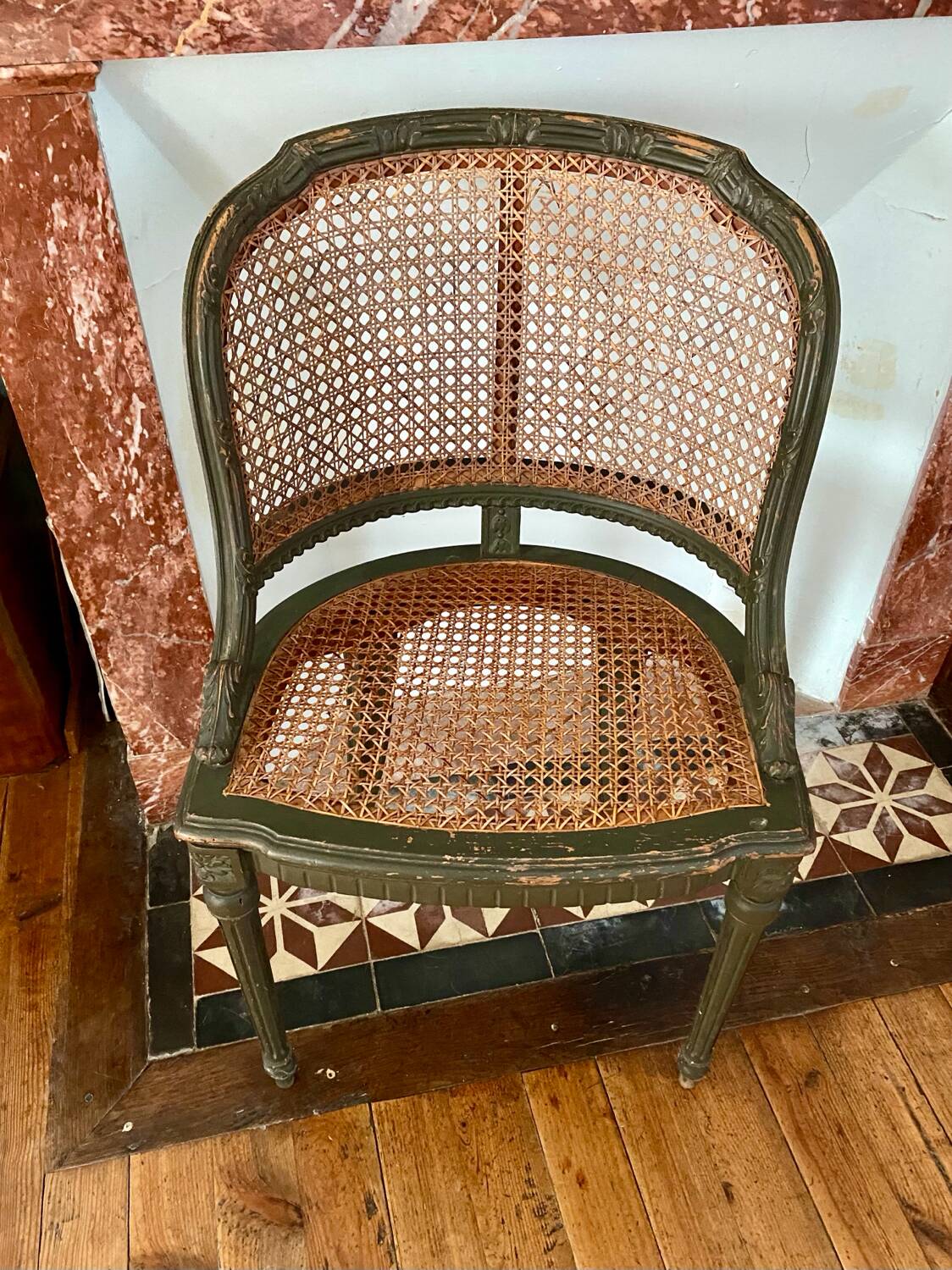 Caned armchair in Louis XVI style
