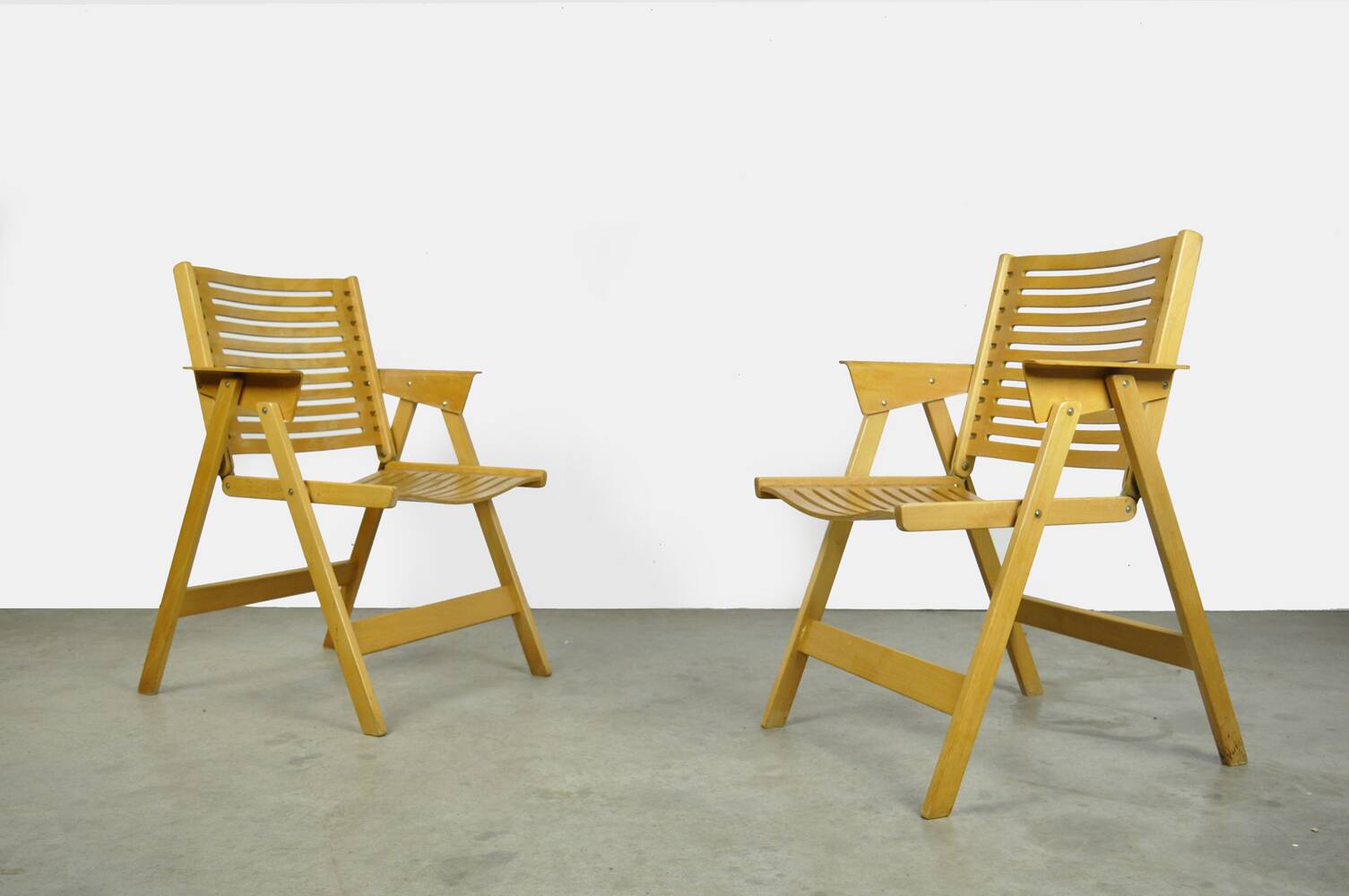 Original vintage foldable dining chairs by the Slovenian architect Niko Kralj (1920-2013) for Stol