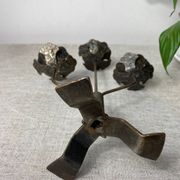 Rose shaped metal candle holder