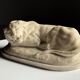 Marble sculpture of a reclining lion