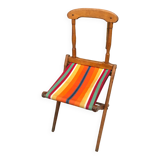 Old vintage camping chair wood and canvas