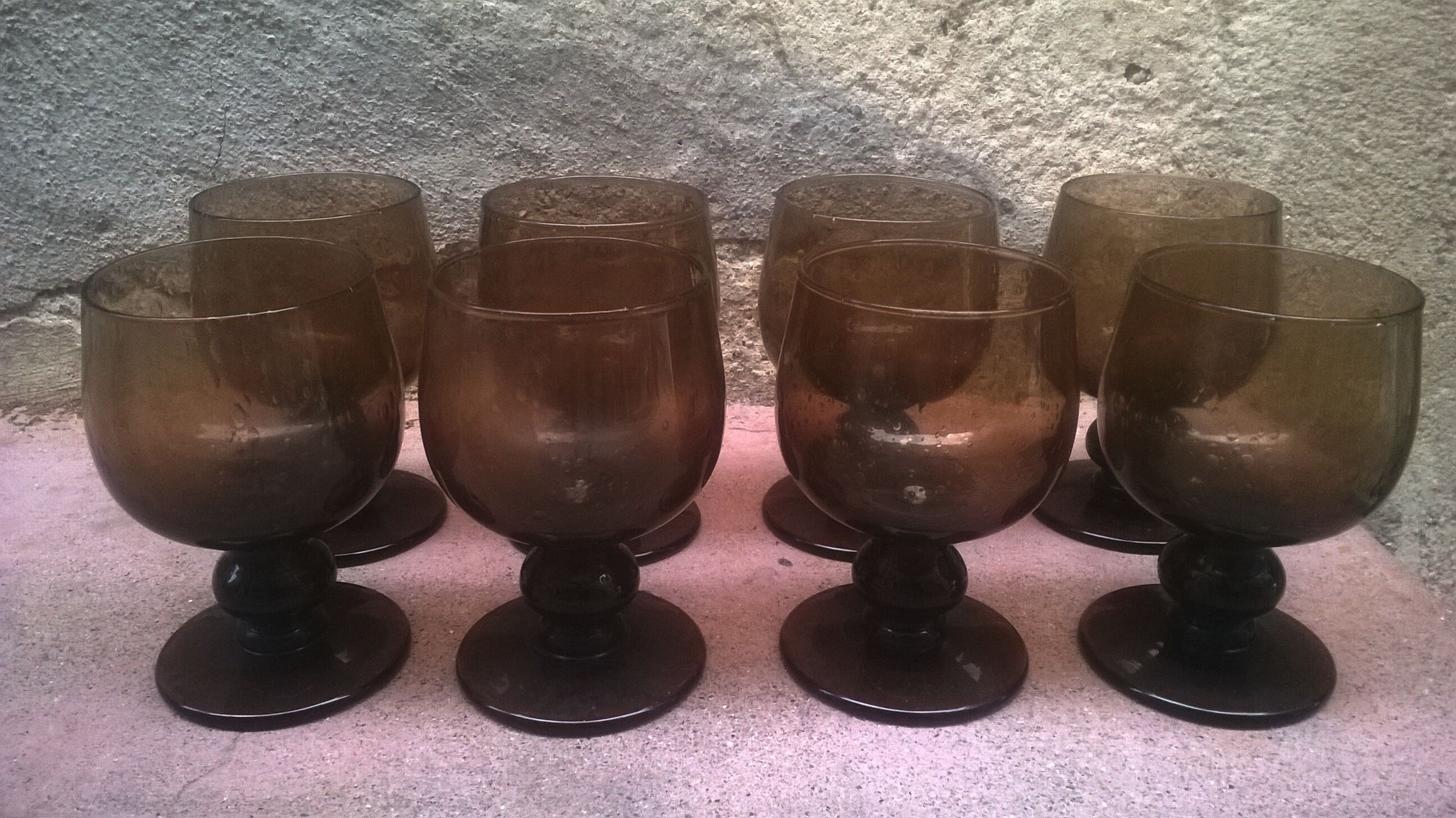 Set of eight glasses bulled on vintage foot