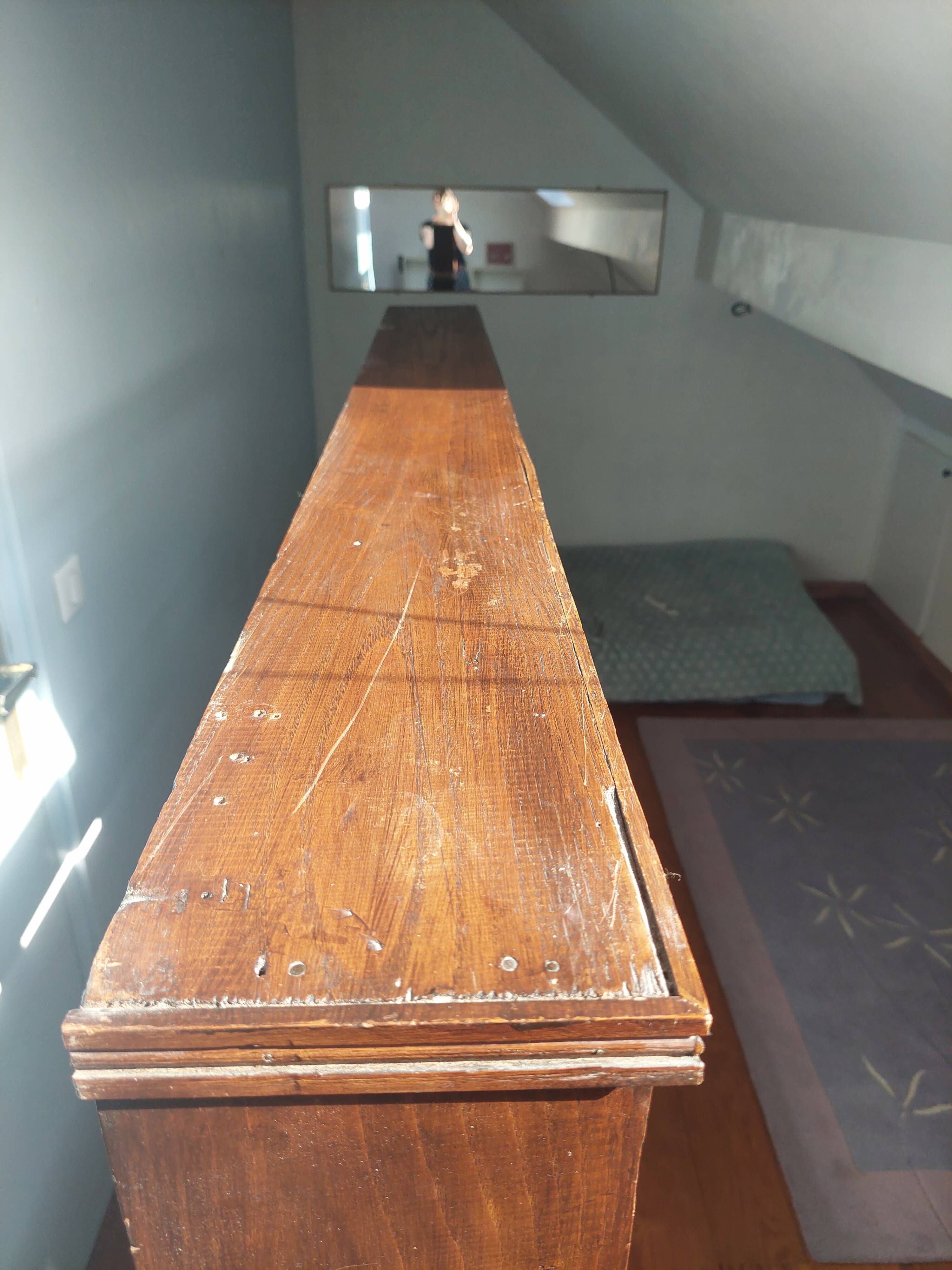 Asymmetrical wall or divider bookcase in dark wood