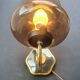 Pair of antique gold-plated brass and smoked glass wall lights.