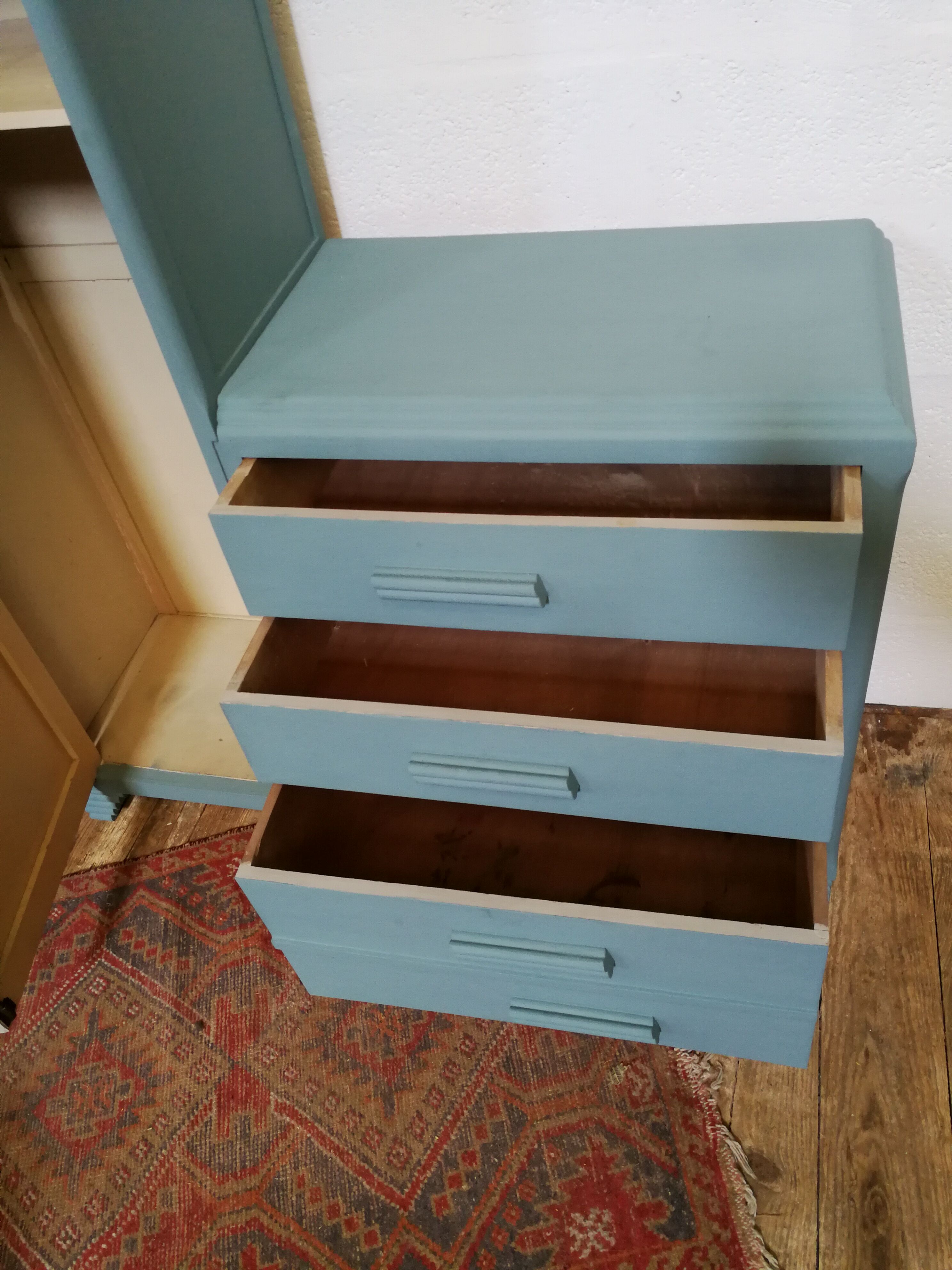 Asymmetrical furniture of the 1950s blue duck