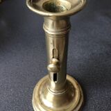Brass candle holder with push button