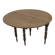 Half-moon extendable oak table for 2 to 8 people.
